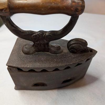 Sale Photo Thumbnail #138: Vintage Cast Iron Charcoal or Coal Iron 

Top portion coming off slightly on one side