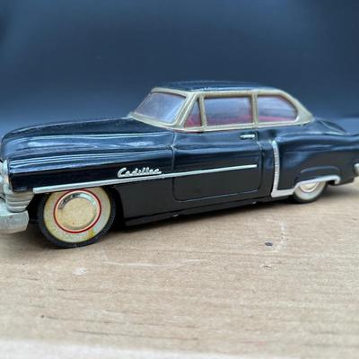 Vintage 1950s Cadillac Sedan Toy Car – Stamped Metal Body, Whitewall Wheels