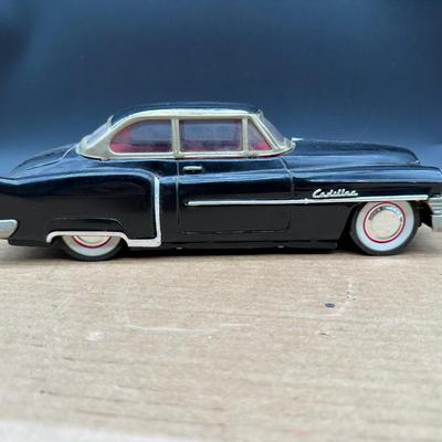 Vintage 1950s Cadillac Sedan Toy Car – Stamped Metal Body, Whitewall Wheels