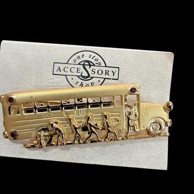 Sale Photo Thumbnail #429: Two School Bus Brooches and One School Bus Key Ring