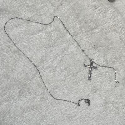 Lot 251 Sterling & CZ cross necklace