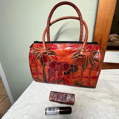 Lot 383 Leather purse African scene