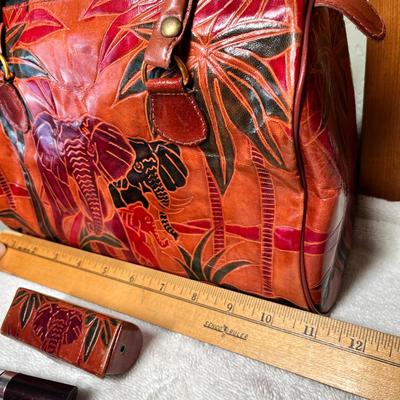 Lot 383 Leather purse African scene