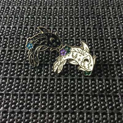 Set of black and white yin Yang koi fish enamel pins