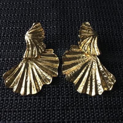 Gold tone dangle statement earrings