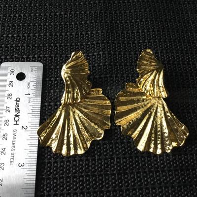 Gold tone dangle statement earrings