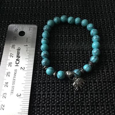 Bohemian blue turquoise beaded stretch bracelet with elephant charm