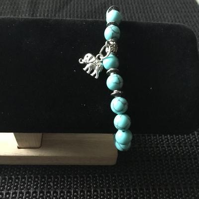 Bohemian blue turquoise beaded stretch bracelet with elephant charm