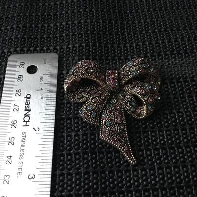 Gold tone ribbon colorful rhinestones brooch