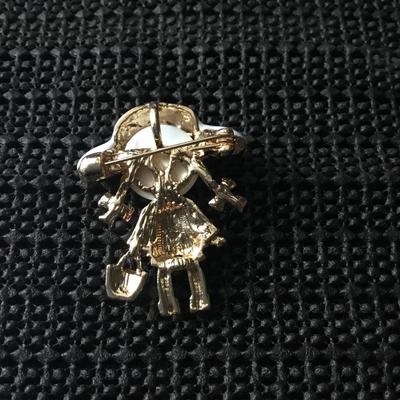 Gold tone pink enemal and opal inlaid little girl brooch pin