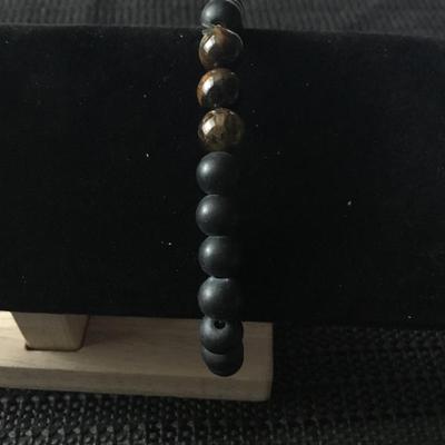 Matte hematite beaded stretch bracelet with accent beads