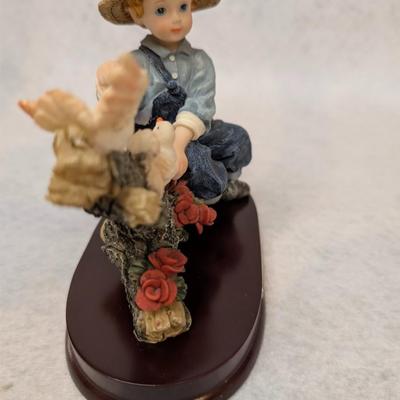 Sale Photo Thumbnail #256: Vintage Montefiori Figurine Boy feeding Birds 
6x3