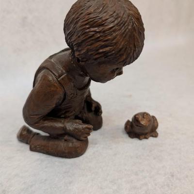Sale Photo Thumbnail #285: Vintage Red Mill 2 pc Boy with Frog Figurine 
handcrafted from solid crushed pecan resin 
signed Somerville