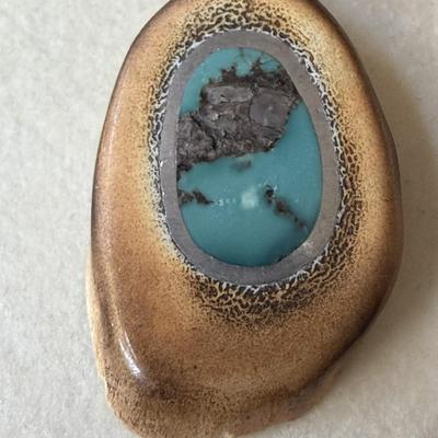 Sale Photo Thumbnail #387: Liquid Silver with turquoise nuggets on the 18" chain.  The turquoise stone is encased in silver and inlaid into the antler.  
What a conversation piece!