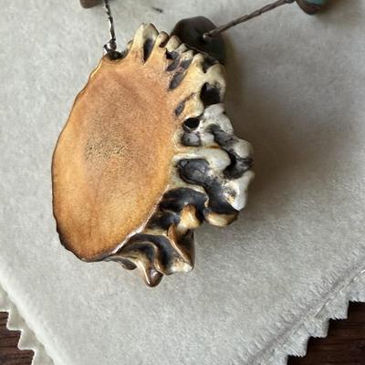 Sale Photo Thumbnail #391: Beautiful turquoise stone on Elk antler, with liquid silver and turquoise nuggets 
on the 16" chain.  Very nice condition.
Statement piece.