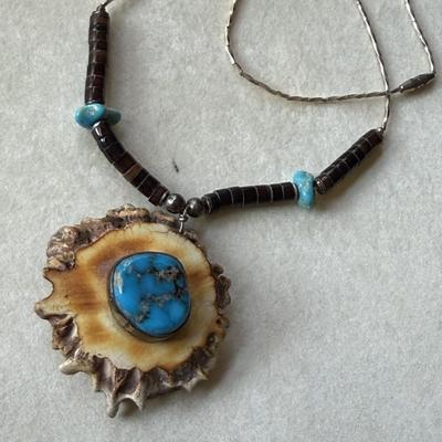 Sale Photo Thumbnail #392: Necklace features heishi and turquoise beads on liquid silver necklace with 16" chain.  
Gorgeous