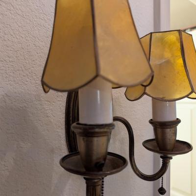 Sale Photo Thumbnail #307: Vintage Brass colored wall sconce w/ amber shades 
untested 
Lamps 9" 
Base 7"
Shades 4x4