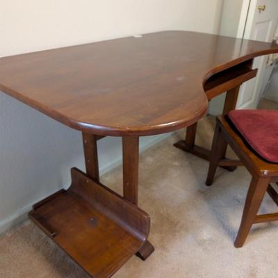 Sale Photo Thumbnail #316: wood desk w/ chair 
4' wide
30" deep
30" high

chair: 42" tall 17" to seat