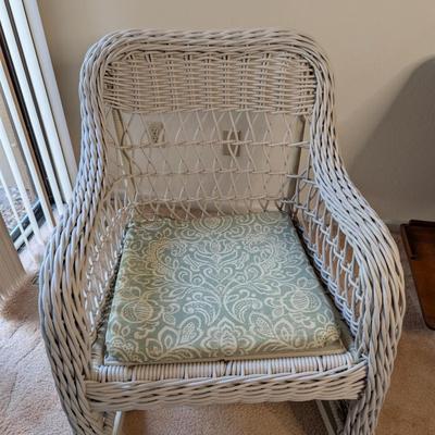 Sale Photo Thumbnail #322: Set of 2 wicker rocking chairs w/ side table 
indoor/outdoor (only used indoors)
excellent condition-no signs of wear 
chairs: 34" high x 26" wide
seat 20" x 20"
Table 20" high x 20" tabletop