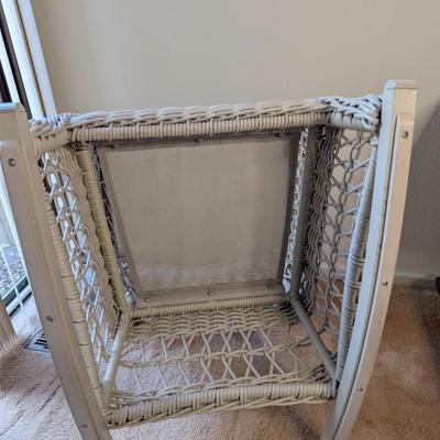 Sale Photo Thumbnail #325: Set of 2 wicker rocking chairs w/ side table 
indoor/outdoor (only used indoors)
excellent condition-no signs of wear 
chairs: 34" high x 26" wide
seat 20" x 20"
Table 20" high x 20" tabletop