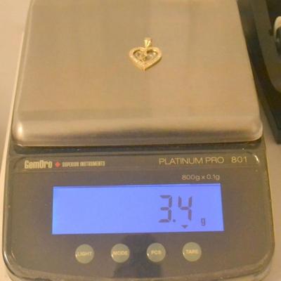 Sale Photo Thumbnail #15: 14 k diamond heart pendant