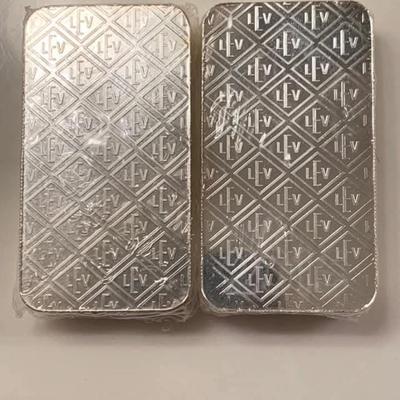 Sale Photo Thumbnail #143: 2 ten oz silver bars