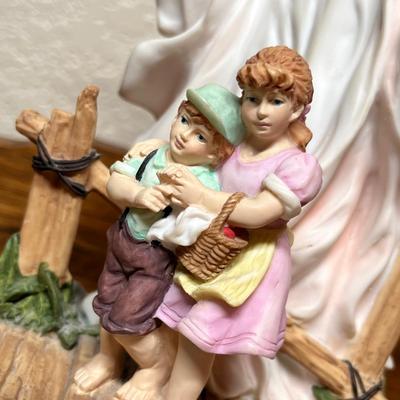 Lot 376 Guardian Angel figure