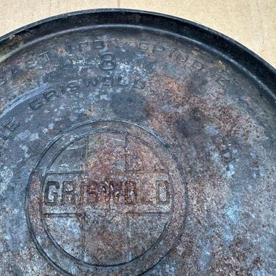 Authentic vintage Griswold cast iron skillet, marked “Griswold” in a circle cross logo, “Erie, PA, U.S.A.”, number 608.