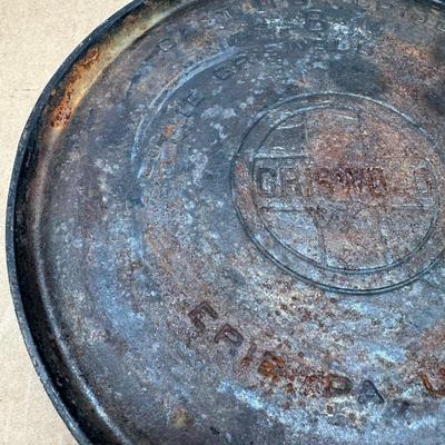 Authentic vintage Griswold cast iron skillet, marked “Griswold” in a circle cross logo, “Erie, PA, U.S.A.”, number 608.