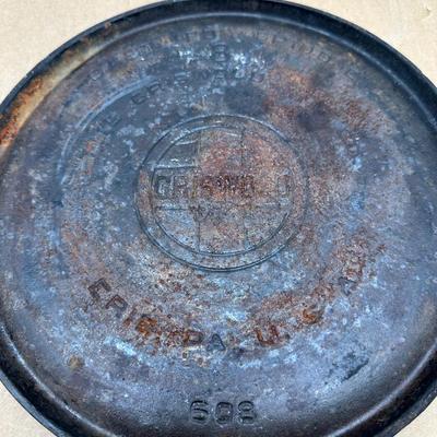 Authentic vintage Griswold cast iron skillet, marked “Griswold” in a circle cross logo, “Erie, PA, U.S.A.”, number 608.