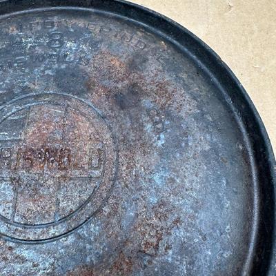 Authentic vintage Griswold cast iron skillet, marked “Griswold” in a circle cross logo, “Erie, PA, U.S.A.”, number 608.