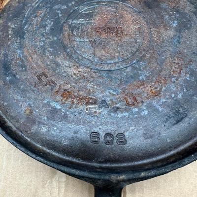 Authentic vintage Griswold cast iron skillet, marked “Griswold” in a circle cross logo, “Erie, PA, U.S.A.”, number 608.