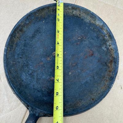 Authentic vintage Griswold cast iron skillet, marked “Griswold” in a circle cross logo, “Erie, PA, U.S.A.”, number 608.