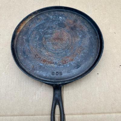 Authentic vintage Griswold cast iron skillet, marked “Griswold” in a circle cross logo, “Erie, PA, U.S.A.”, number 608.