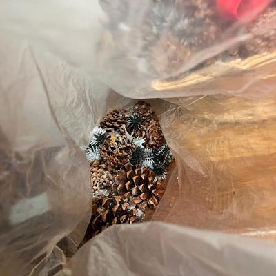 Lot 415 Pinecones in basket