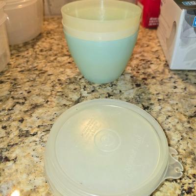 3 tupperware bowls and 4 lids