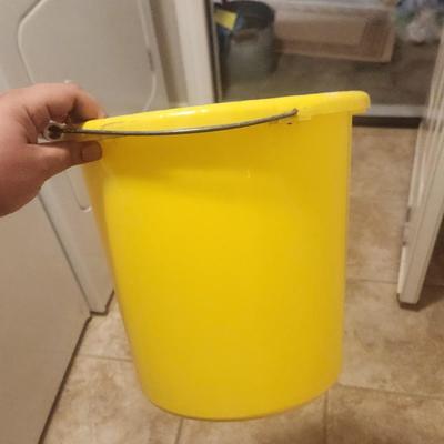 Yellow mop bucket