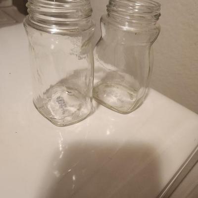 2 clear glass jars