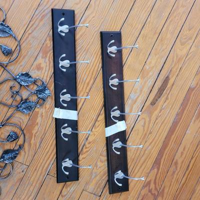 Sale Photo Thumbnail #444: Coat hangers have hardware, wall deco is iron