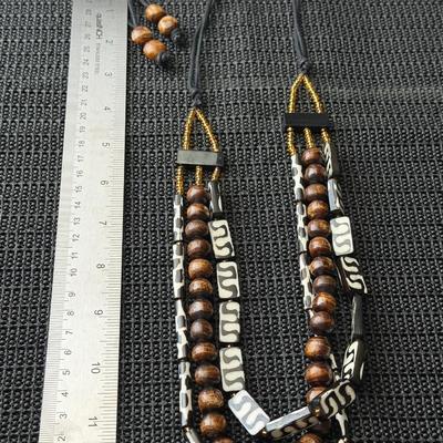 multi-layered African-inspired tribal necklace featuring bone and wood beads