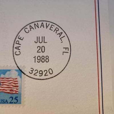 Sale Photo Thumbnail #453: This lot is for a copy of the First Man on The Moon Stamp Poster that has also been stamped and posted (1988) as a First Day Commemorative Issue.  Neil Armstrong made contact with the moon surface in 1969.  A rare and nice historical find.  Perfect for fr