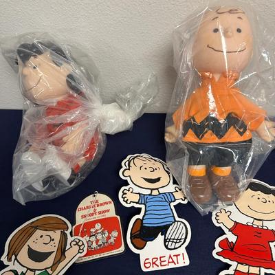 Sale Photo Thumbnail #53: Lot of Peanuts Items
Lucy
Charlie Brown
Snoopy
Misc Peanut character cardboard cutouts