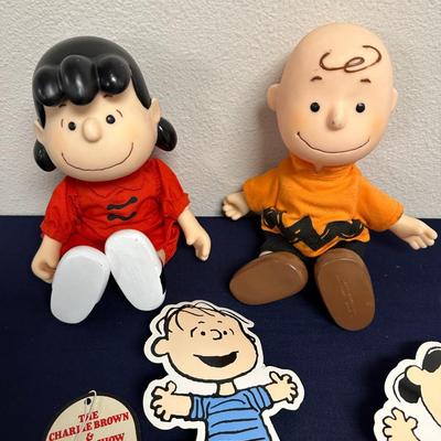 Sale Photo Thumbnail #48: Lot of Peanuts Items
Lucy
Charlie Brown
Snoopy
Misc Peanut character cardboard cutouts