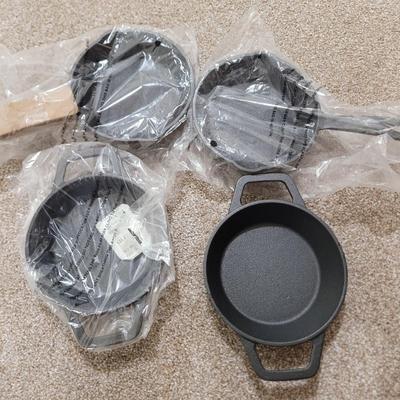 Sale Photo Thumbnail #450: New in manufacturers plastic, perfect for small batch cooking, remember, a serving size for a steak is 4 ounces, these will help your portion control.