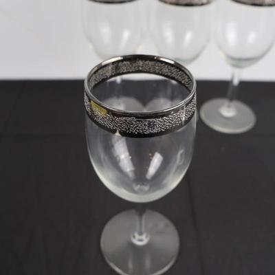 Silver rimmed wine glasses (5)