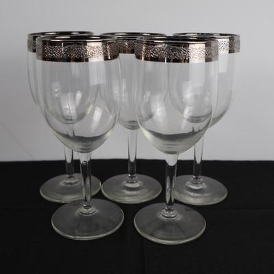Silver rimmed wine glasses (5)