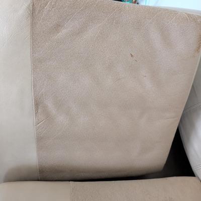 Sale Photo Thumbnail #10: Nice Lazy Boy Sofa, taupe in color, no tears or stains on the leather. The stain underneath the cushion is a water stain from a drink.