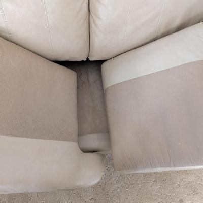 Sale Photo Thumbnail #26: Lazy Boy leather loveseat, taupe in color, no rips or stains on leather. The stain underneath the cushions is a water stain.