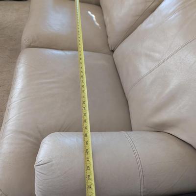 Sale Photo Thumbnail #28: Lazy Boy leather loveseat, taupe in color, no rips or stains on leather. The stain underneath the cushions is a water stain.