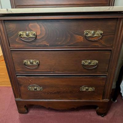 Sale Photo Thumbnail #10: Vintage walnut marble top dresser 
missing mirror, otherwise in excellent condition 
52" high
29 1/2" from floor to marble top 
30" wide
14" deep